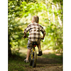 small boy on bike